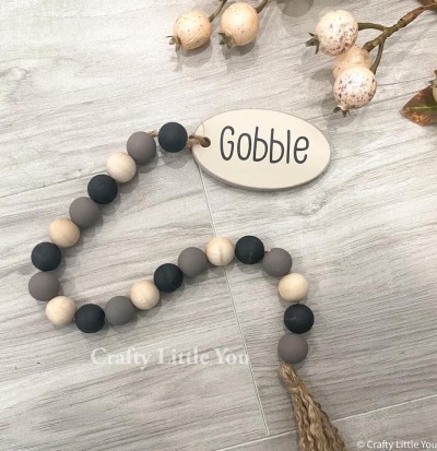 Unfinished kit includes wooden MDF
•OVAL
•Black GOBBLE vinyl
and measures apx. 3.5” long

