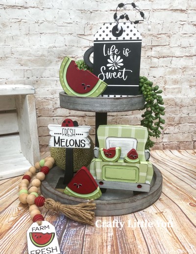Unfinished kit measures 5.75” tall on the Truck and includes wooden MDF”
•truck and tailgate with watermelons attached
•2 watermelons with grooves
•1 street sign, base and vinyl
•vinyl seeds
•tag with white vinyl life is sweet
