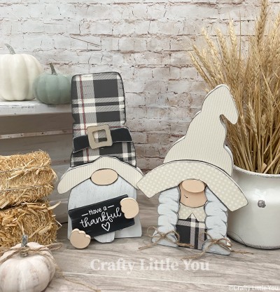 Unfinished kit includes wooden MDF: 
* 2 Hats
* 2 Brims
* 1 Hat Buckle 
* 1 Dress
* 1 Sign 
* White Vinyl
* 10 Velcros