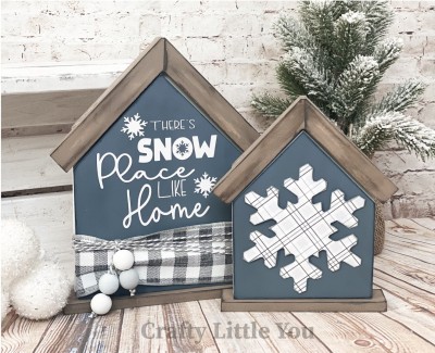 Unfinished kit measures apx. 8"x6.25" and includes wooden MDF: 
* 2 house overlays 
* 2 Velcro pieces
* White vinyl 
(Snowflake vinyl is placed on paper and then cut out.) 