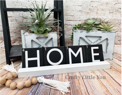 Unfinished kit measures apx. 13"x3.25" and includes wooden MDF: 
* Board with grooves
* White vinyl word and numbers
