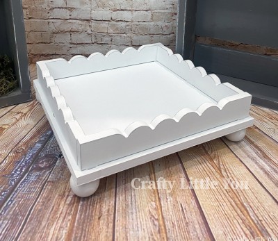 Unfinished kit measures apx. 11.5"x11.5" and includes wooden MDF:
* 1 wooden base with peg holes
* 4 scalloped sides with pegs that fit into base

