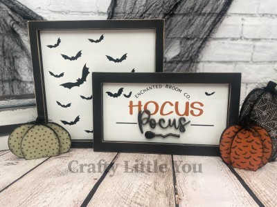 Unfinished kit measures apx. 7.5"x13" and includes wooden MDF: 
* Back piece
* Frame
* "Pocus" and broom 3D wood cutouts
* Black vinyl (some is stencil) 

- 12x12 sign sold separately. - 