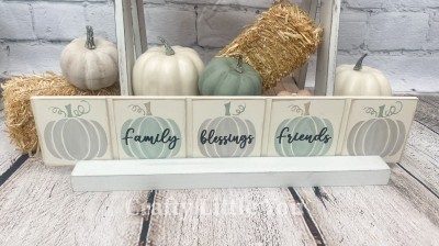 Unfinished kit measures apx. 13"x3.25" and includes wooden MDF: 
* Board with grooves
* Black vinyl (pumpkins are stencil)

* Picture stand is not included.* 