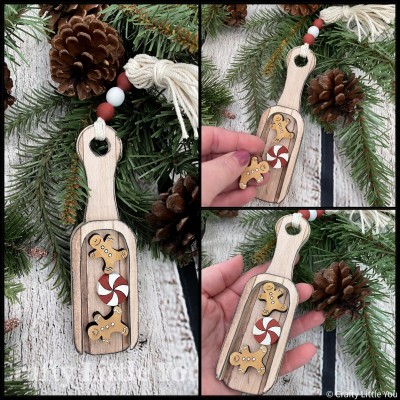 Unfinished kit measures apx. 5.75" tall and includes wooden MDF: 
* 1 scoop with rim overlay
* 2 miniature gingerbread men
* 1 miniature peppermint 