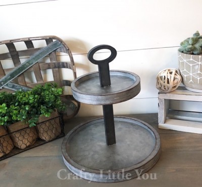 Unfinished tray measures 
11” wide on the base 
7.25” on the top tier 
12” tall and 6.5” in between the two trays 
TRAY is made out of wooden MDF 
Comes all unassembled and will have tabs to fit inside holes for assembling. You will need to glue them into place. 
