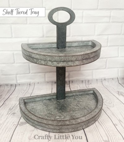 Unfinished kit measures apx. 11" wide on bottom, 12.5" tall, and 6" between the two tiers.  Includes wooden MDF: 
* 2 base half circles
* 2 edge overlays for base pieces 
* 1 handle piece 
* 1 stand piece 

