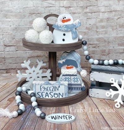 Unfinished kit measures 6” tall on the bottom snowman and includes wooden MDF” 
•snowman, scarf, and nose stencil 
•snowman, sweater,brim and stencil 
•snowflake 
•sign and vinyl stencil 
