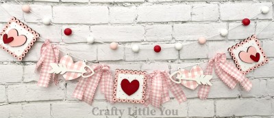 Unfinished kit measures apx. 4.5" on square  heart signs and includes wooden MDF: 
* 3 scalloped plaques
* 5 heart overlays (Small heart overlays are found in the middle of the arrows.) 
* 2 hanging hearts
* 2 arrow overlays