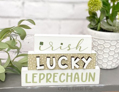 Unfinished kit measures apx. 7"x4.5" and includes wooden MDF: 
* 3 wood blocks
* LUCKY wood overlay letters
* Vinyl stencil