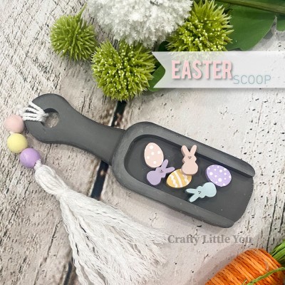 Unfinished kit measures apx. 5.75" tall and includes wooden MDF: 
* 1 scoop with rim overlay
* 3 miniature peeps
* 3 miniature Easter eggs