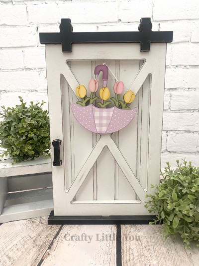 Unfinished kit measures apx. 7.25" and includes wooden MDF:
* 1 umbrella with attached tulips