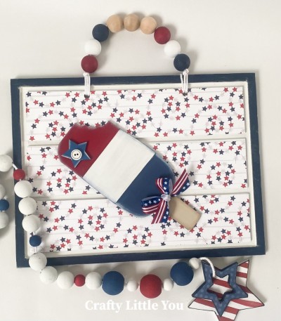 Unfinished kit measures apx. 8.5"x12" and includes wooden MDF: 
* 1 rectangle plaque with grooves
* 1 popsicle overlay
* 1 star overlay
* 1 button overlay
