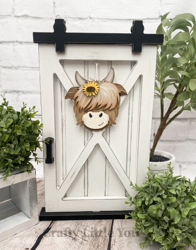 Unfinished kit measures apx. 5" tall and includes wooden MDF:
* 1 cow main piece
* 1 forehead hair overlay
* 1 snout overlay
* 1 sunflower overlay
* 1 sunflower center overlay