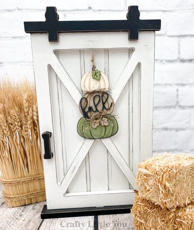 Unfinished kit measures apx. 5.75"  tall and includes wooden MDF:
*1 set of connected stacking pumpkins
*3 leaf overlays
*1 "fall" wood word overlay
