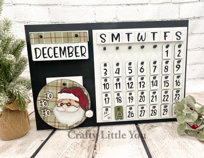 Unfinished kit measures apx. 5" and includes wooden MDF:
*1 hanging circle
*1 Santa main piece
*1 hat and eyebrows overlay
*1 hat brim overlay
*1 mustache, nose, and glasses overlay
*3 “Ho Ho Ho” wood word overlays
*1 hanging tag
*1 miniature Christmas tree