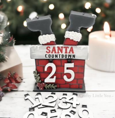 Unfinished kit measures apx. 9.5" and includes wooden MDF:
*1 chimney main piece with attached Santa legs and engraved bricks
*2 fur overlays for pants
*1 chimney top overlay with engraved lettering
*1 set of Christmas berries with berry overlays
*2 pegs
*1 set of countdown numbers
*1 base