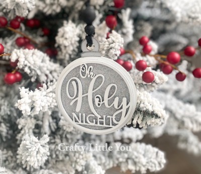Unfinished kit measures apx. 5" and includes wooden MDF:
*1 ornament main back piece
*1 circle overlay with attached “O Holy Night” lettering
