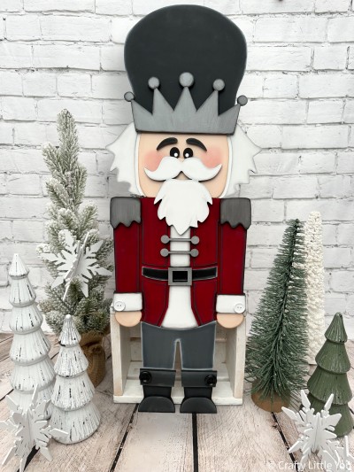 Unfinished kit measures apx. 30" tall and includes wooden MDF:
*1 Nutcracker head piece with attached hat
*1 crown overlay
*1 mustache with attached beard and eyes
*2 eyebrows
*1 Nutcracker torso piece
*2 shoulder piece overlays
*2 jacket cuff overlays
*2 jacket fastener overlays
*1 buckle overlay
*1 Nutcracker legs piece
*2 boot cuff overlays
*2 boot toe overlays
*2 supporting brace pieces to attach on back of Nutcracker.

*Head, torso and legs are separate from one another and can be connected by the brace pieces that are included in the kit.