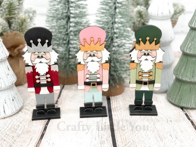 Unfinished kit measures apx. 8" tall and includes wooden MDF: *3 Nutcraker's *3 Base's *3 sets of overlays for Nutcrackers