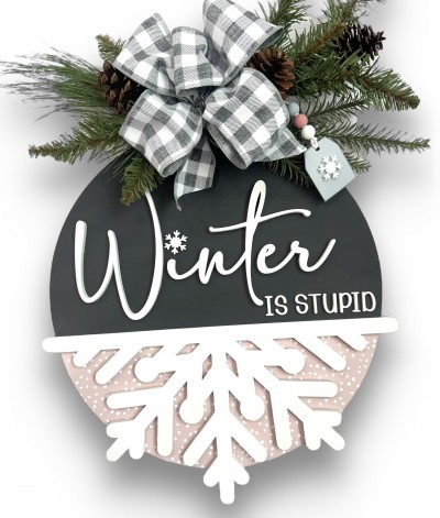 Unfinished kit measures apx. 15" and includes wooden MDF:
*2 half circles
*1 half snowflake overlay
*1 “Winter” word overlay
*1 set of “Is Stupid” wood letters
*2 small snowflake overlays
*1 hanging tag