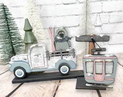 Unfinished kit measures apx. 4.75" on the polar bear and includes wooden MDF:
*1 polar bear main piece
*1 snow hat overlay
*1 nose
*1 scarf
*1 polar bear body overlay
*1 pair of connected skis
*1 ski lift pole
*1 gondola car main piece
*1 gondola car overlay
*1 base