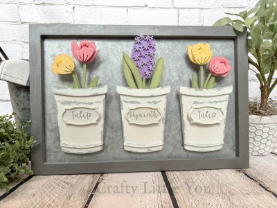 Unfinished kit measures apx. 6.25" tall on the hyacinth and includes wooden MDF:
*4 tulips with attached stems
*4 center tulip petal overlays
*4 top tulip petal overlays
*1 hyacinth with attached stem
*1 hyacinth leaf overlay
*Hyacinth bud overlays
*3 signs
*3 sign frames
*Vinyl stencil
*3 Velcro dots