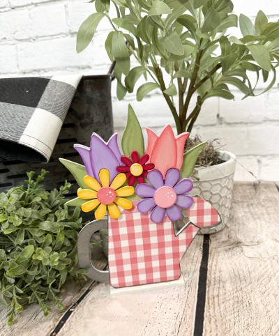 Unfinished kit measures apx. 8.25" tall and includes wooden MDF:
*1 flower pot main piece with attached flowers
*2 tulip overlays
*3 daisy overlays
*3 flower center overlays
*1 base