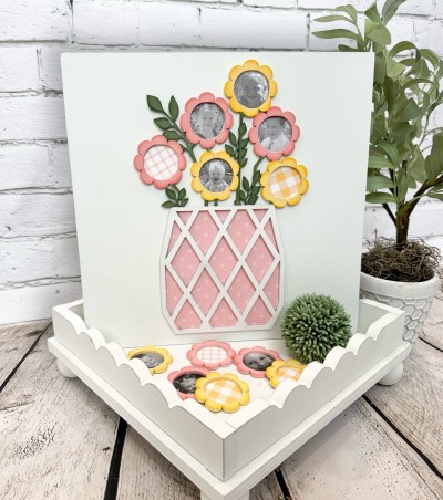 Unfinished kit measures apx. 12"x12" and includes wooden MDF:
*1 sign main piece
*1 diamond flower pot
*1 set of connected flowers with cut-out centers and leaves
*6 flower overlays