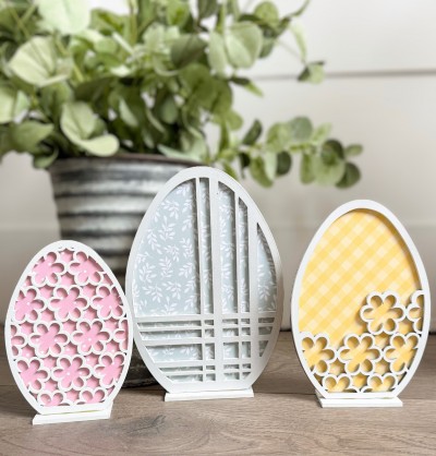 Unfinished kit measures apx 7" on tallest egg and includes wooden MDF:*1 - 7" egg with lasered overlay *1 - 6" egg with lasered overlay *1  - 5" egg with lasered overlay *3 bases