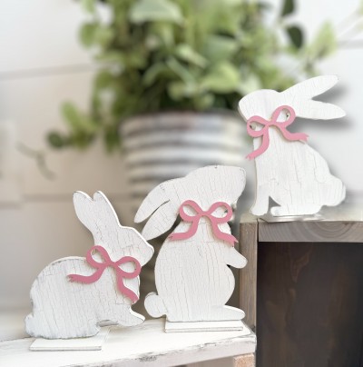 Unfinished kit measures apx 5.5" on tallest bunny and includes wooden MDF: *3 bunnies *3 bases *3 bows