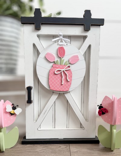 Unfinished kit measures apx 5" and includes wooden MDF: *1 engrave circle *1 tulip bunch in jar *1 bow