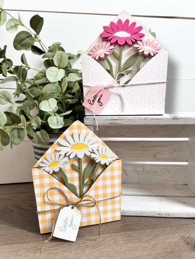 Unfinished kit measures apx 8.5" and includes wooden MDF: *1 - back piece of envelope *2 - 1/8" spacers *1 - front piece of envelope *1 - large flower with overlay *2 - small flowers with overlays *1 - “love you” tag